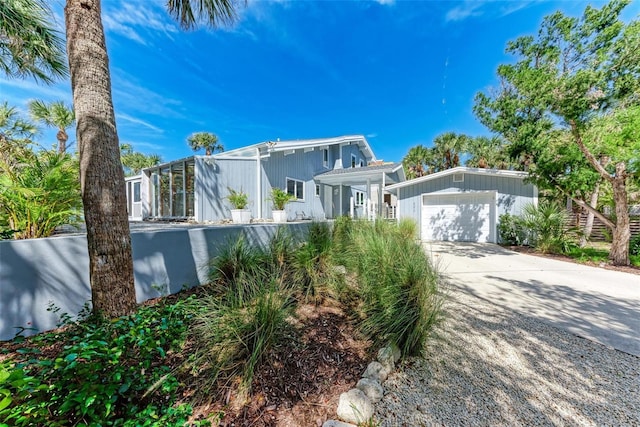 view of front of house with an attached garage and concrete driveway