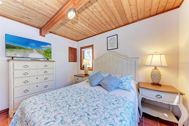 bedroom with wooden ceiling, beam ceiling, and tile patterned floors