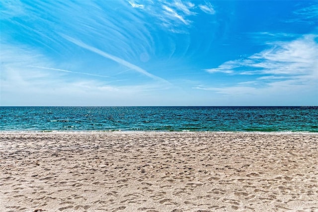 property view of water featuring a beach view