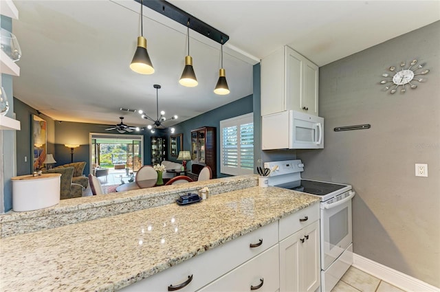 kitchen featuring hanging light fixtures, white appliances, light stone countertops, and white cabinets