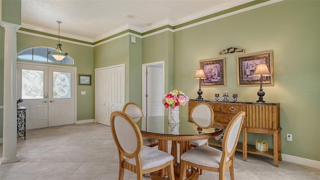 dining room with light tile patterned floors, french doors, baseboards, and ornamental molding