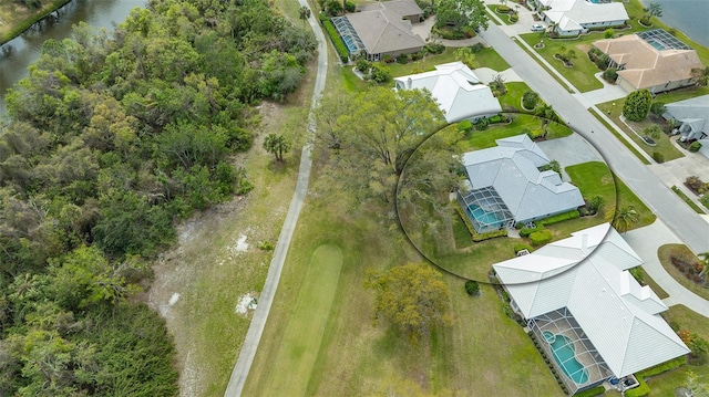 aerial view featuring a residential view and a water view