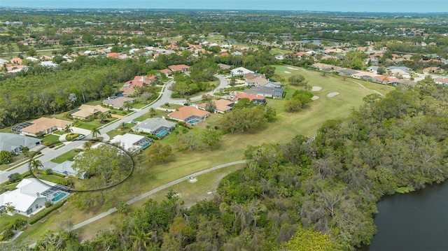 bird's eye view featuring a residential view and a water view