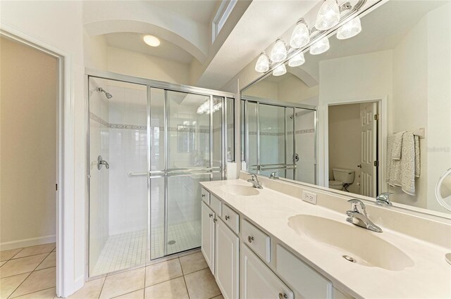 full bathroom with a sink and a shower stall