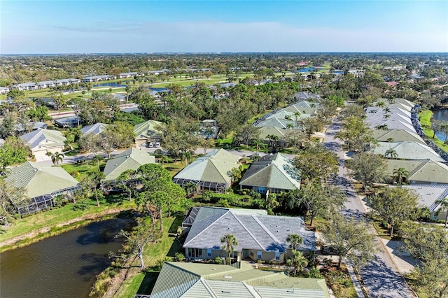 aerial view featuring a residential view and a water view