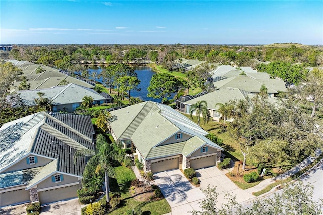 drone / aerial view with a water view