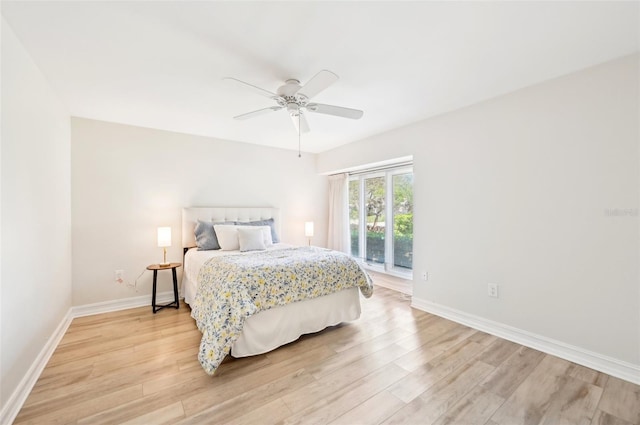 bedroom featuring light wood-type flooring, access to exterior, ceiling fan, and baseboards