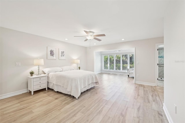 bedroom with light wood-style flooring, baseboards, and recessed lighting