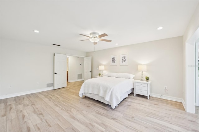 bedroom with baseboards, recessed lighting, visible vents, and light wood-style floors