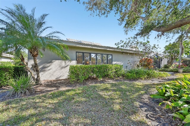 exterior space with stucco siding