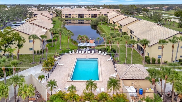 bird's eye view featuring a water view and a residential view