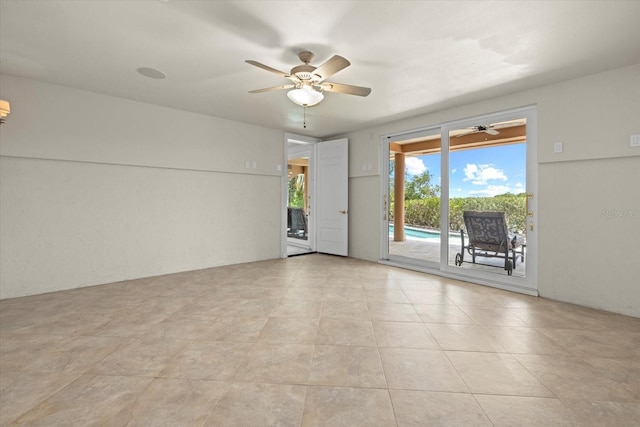1364 Point Crisp Rd, Sarasota, FL 34242 - empty room with a ceiling fan