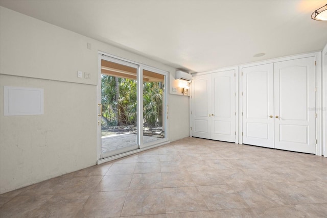 1364 Point Crisp Rd, Sarasota, FL 34242 - interior space featuring an AC wall unit
