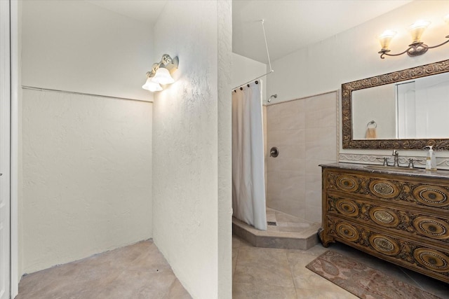 1364 Point Crisp Rd, Sarasota, FL 34242 - bathroom with tile patterned floors, tiled shower, and vanity