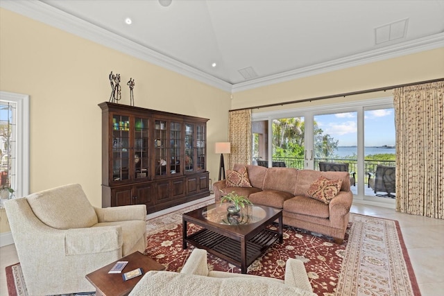 1364 Point Crisp Rd, Sarasota, FL 34242 - living room featuring crown molding, visible vents, tile patterned floors, and recessed lighting