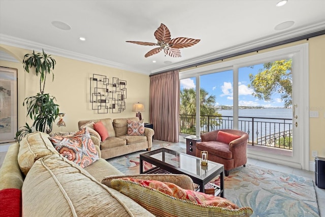 1364 Point Crisp Rd, Sarasota, FL 34242 - living room featuring crown molding, ceiling fan, recessed lighting, and a water view