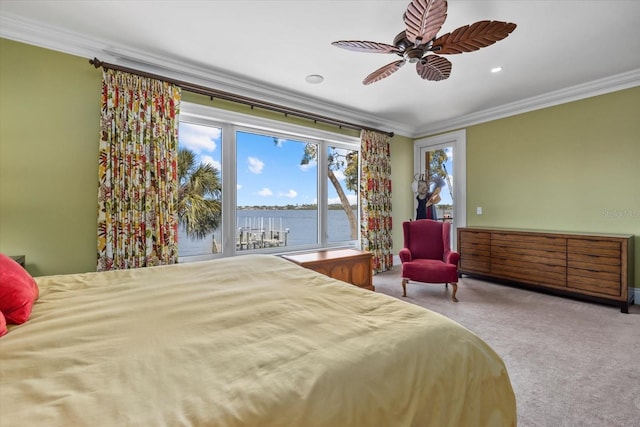 1364 Point Crisp Rd, Sarasota, FL 34242 - bedroom featuring crown molding, a ceiling fan, and a water view