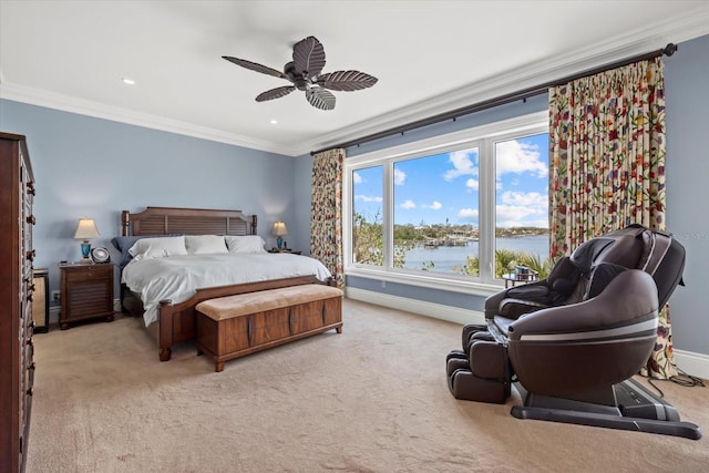 1364 Point Crisp Rd, Sarasota, FL 34242 - carpeted bedroom featuring crown molding, ceiling fan, baseboards, and a water view
