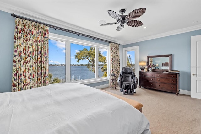 1364 Point Crisp Rd, Sarasota, FL 34242 - bedroom featuring baseboards, ornamental molding, carpet floors, ceiling fan, and a water view