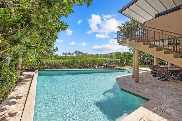 1364 Point Crisp Rd, Sarasota, FL 34242 - outdoor pool with a patio area and stairs