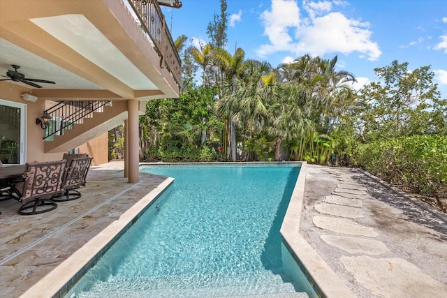 1364 Point Crisp Rd, Sarasota, FL 34242 - outdoor pool with a patio area, ceiling fan, and stairway