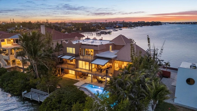 1364 Point Crisp Rd, Sarasota, FL 34242 - aerial view at dusk with a water view