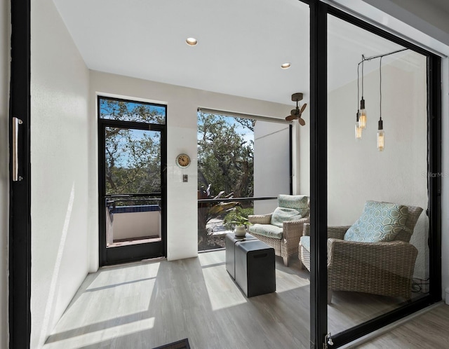 doorway with recessed lighting and wood finished floors