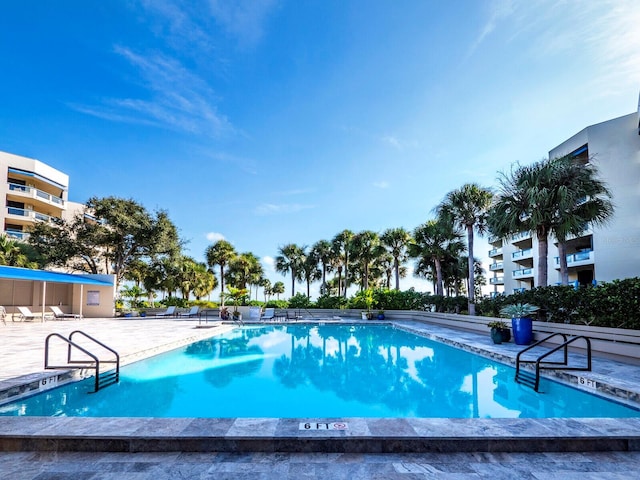 pool featuring a patio area