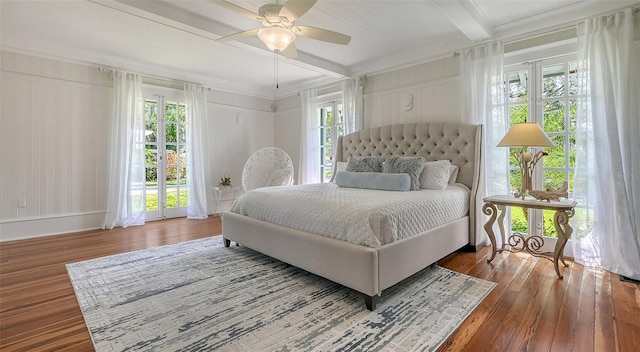 7715 Westmoreland Dr, Sarasota, FL 34243 - bedroom with beam ceiling, wood finished floors, and ceiling fan