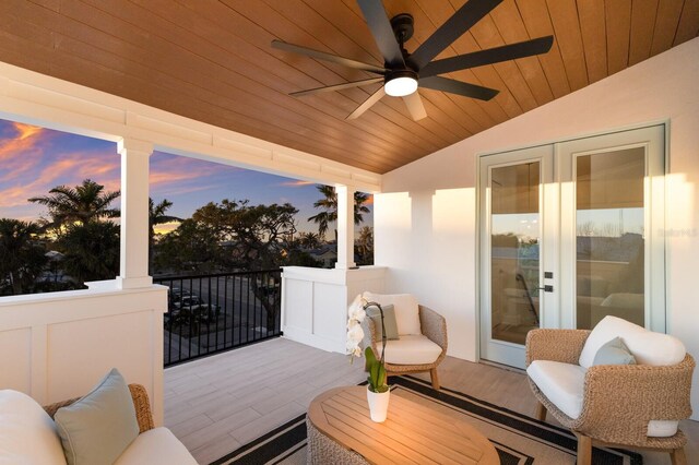 exterior space with a ceiling fan