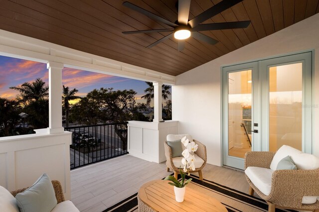 exterior space featuring ceiling fan