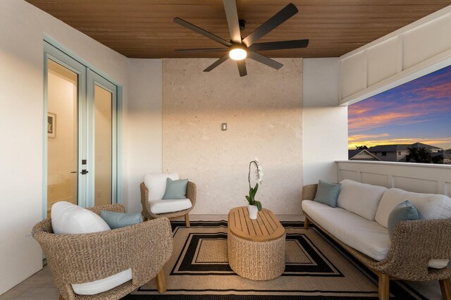 view of patio / terrace featuring french doors, an outdoor hangout area, and a ceiling fan