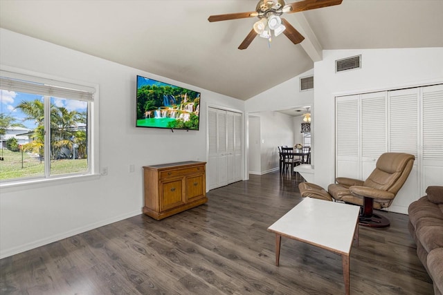 living room with lofted ceiling with beams, a ceiling fan, visible vents, and wood finished floors