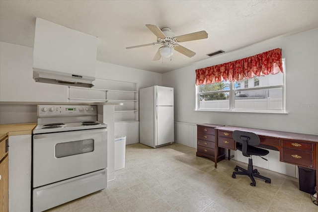 kitchen with under cabinet range hood, white appliances, visible vents, light countertops, and light floors