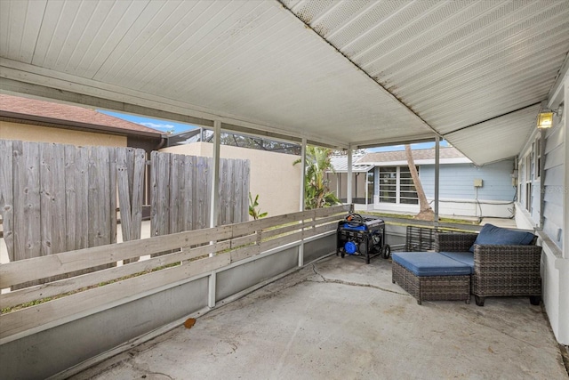 view of patio with grilling area and fence