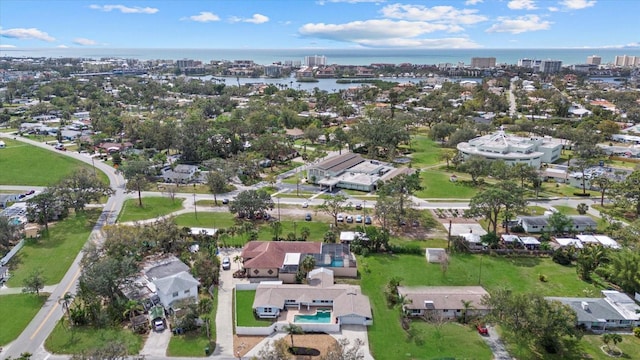 birds eye view of property featuring a water view