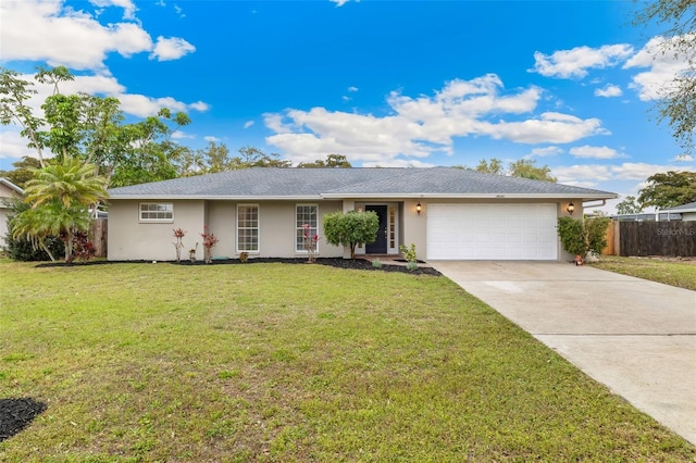 single story home featuring a front yard, fence, driveway, stucco siding, and a garage