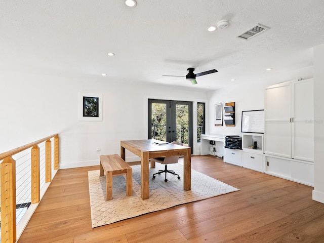 office featuring recessed lighting, visible vents, and light wood finished floors