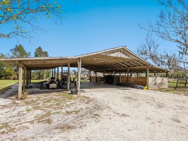 view of parking featuring a carport