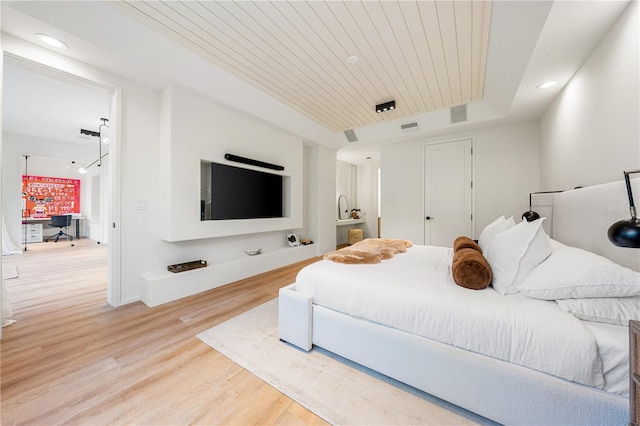 bedroom with baseboards, visible vents, wooden ceiling, wood finished floors, and recessed lighting