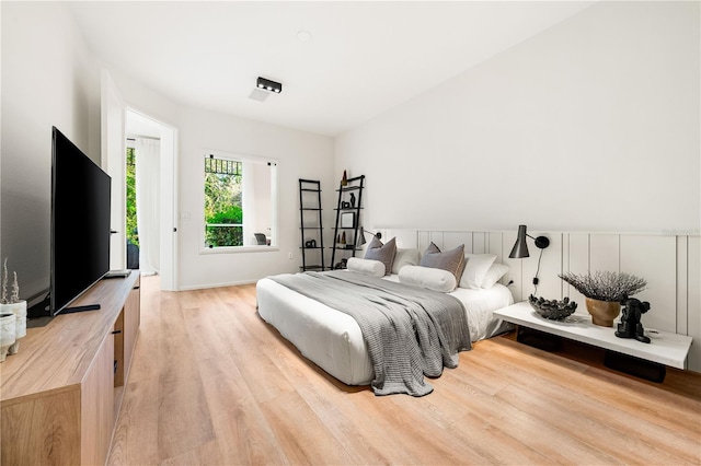 bedroom featuring light wood-style floors