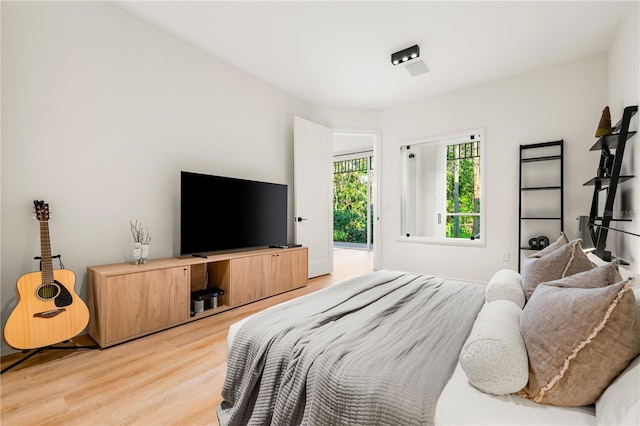 bedroom featuring light wood-type flooring