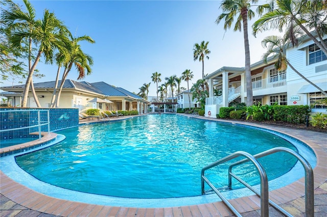 community pool featuring a residential view