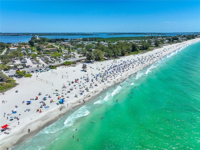 aerial view featuring a water view and a beach view