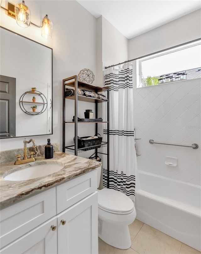 bathroom with shower / tub combo, tile patterned flooring, vanity, and toilet