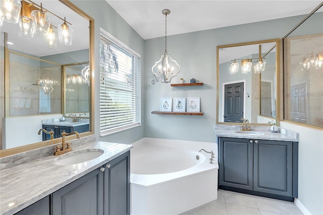 bathroom featuring a stall shower, tile patterned floors, a sink, and a bath