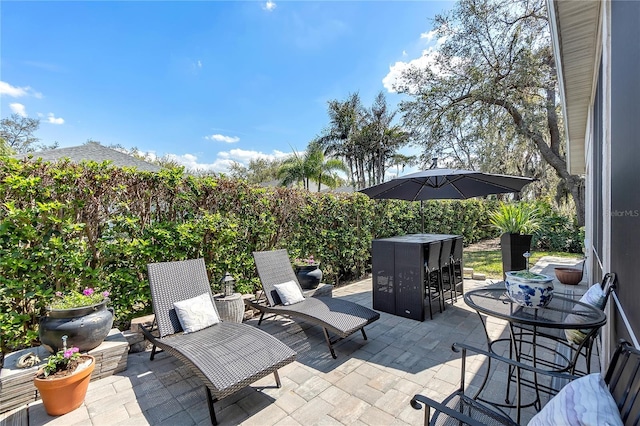 view of patio featuring outdoor dining area