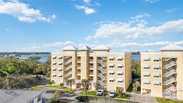 view of building exterior featuring a water view