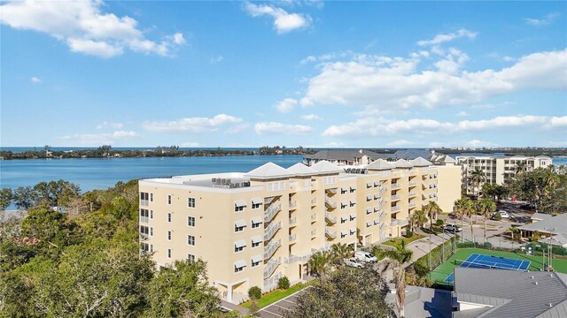 view of building exterior with a water view