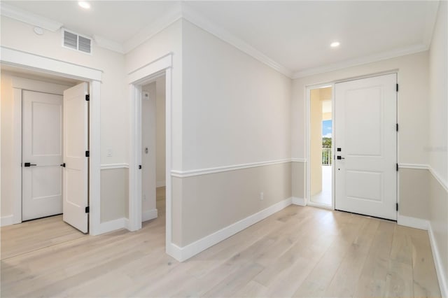 280 Hidden Bay Dr Unit 202, Osprey, FL 34229 - entrance foyer featuring light wood-type flooring, ornamental molding, baseboards, and recessed lighting